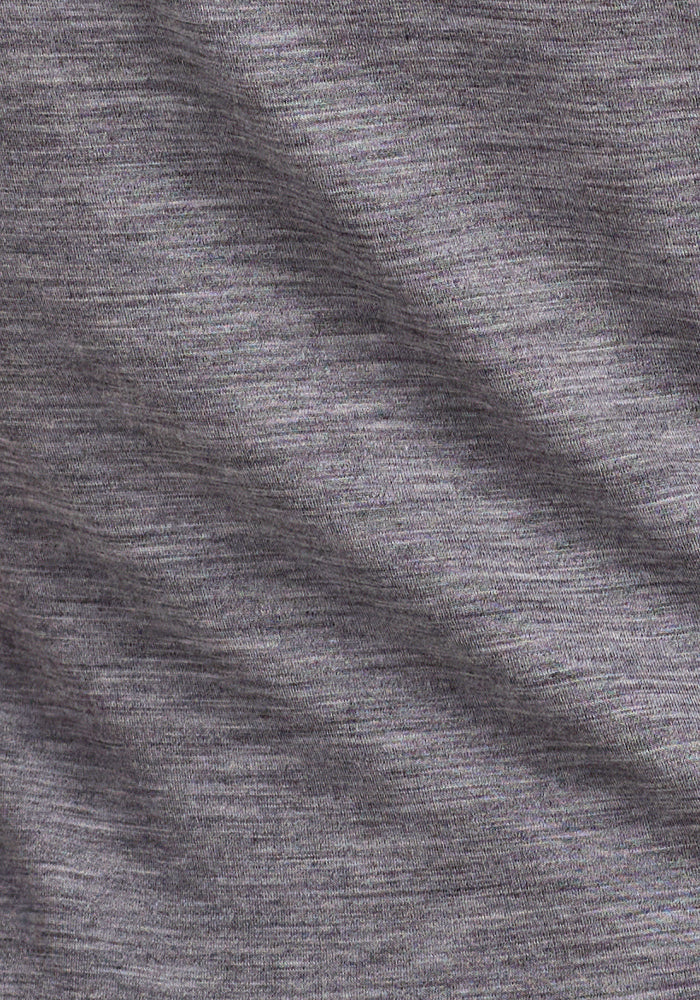 Close-up of the Ashton V Neck in Graphite Heather by Woolx, highlighting its soft Merino wool fabric with subtle horizontal lines and a gentle diagonal fold.