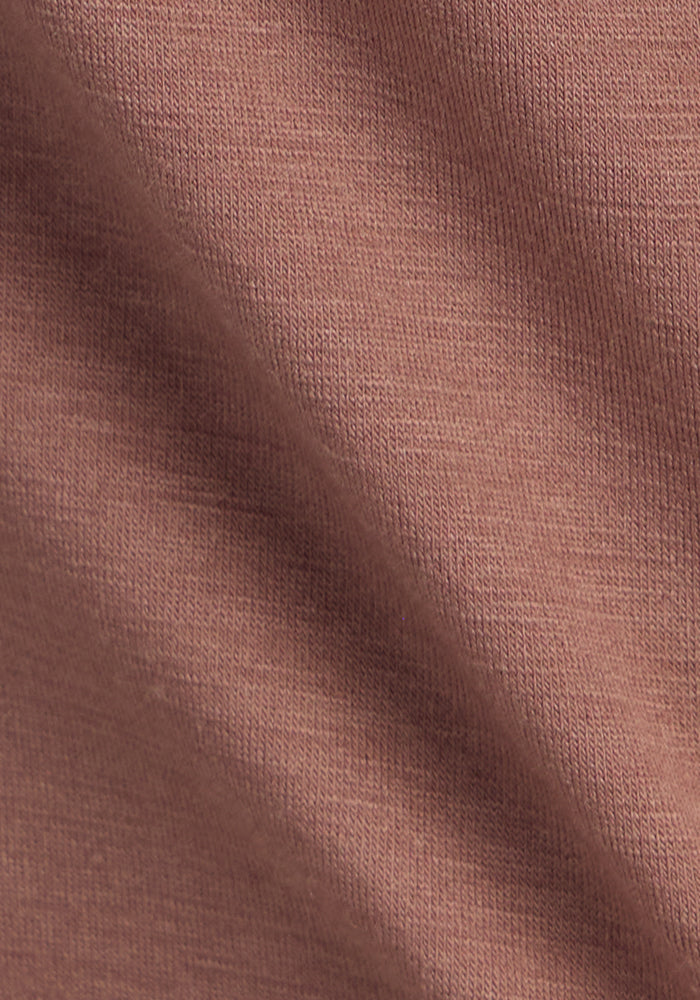Close-up of soft, ribbed Sienna Kiss fabric—like Woolx’s Endurance Tee—with visible texture and gentle folds.