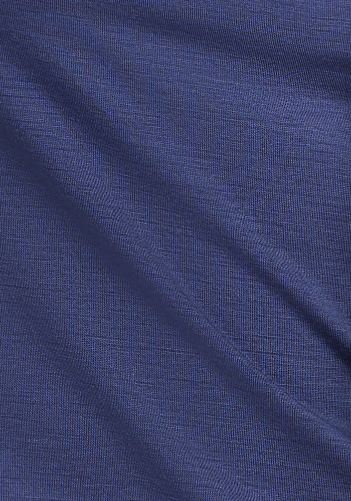 Close-up of the Blue Horizon fabric for the Woolx Gracie Bodysuit, featuring a subtle diagonal texture. The smooth surface has a soft sheen, providing ultimate comfort with its fine weave details—perfect for your summer wardrobe.