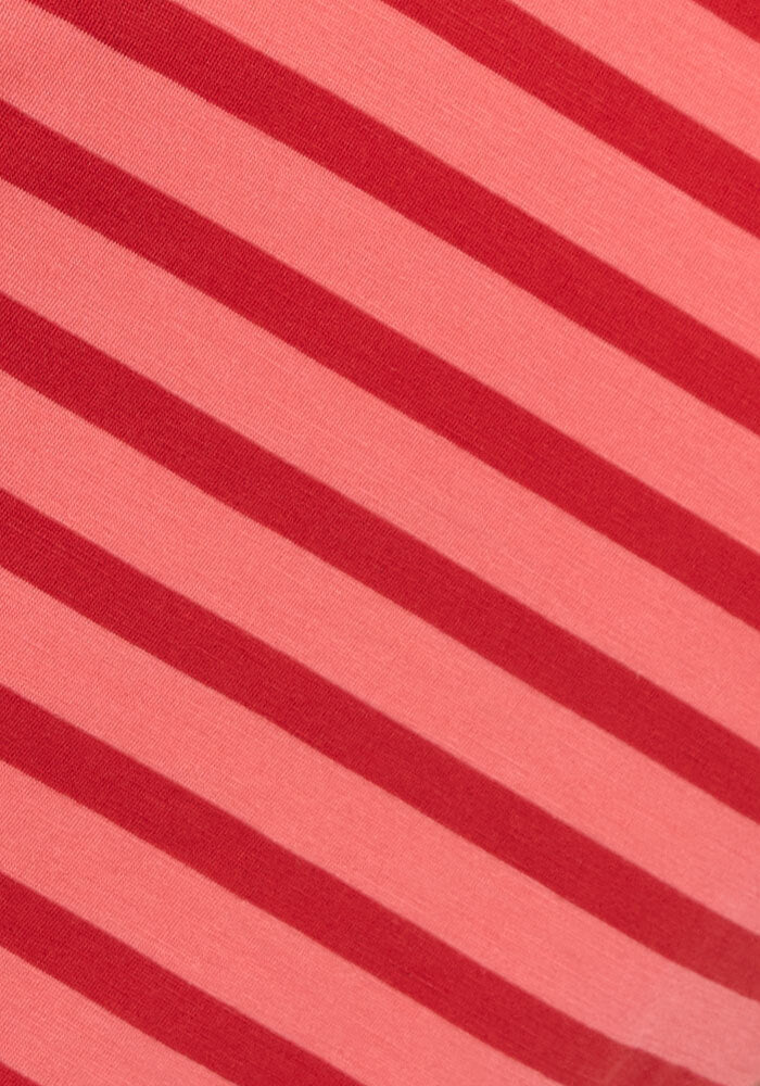 The Woolx Liza Crew Neck Tee - Wildberry Stripe features bold, evenly spaced red and pink diagonal stripes in stylish Australian merino wool, offering vibrant color and premium softness.