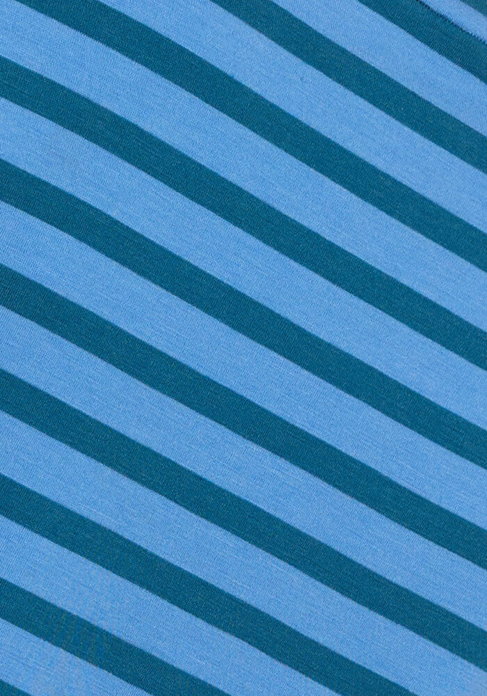 Close-up of the Woolx Mia V Neck - Coastal Stripe, showing moisture-wicking Merino wool fabric with diagonal dark teal and light blue stripes running bottom left to top right. The knit texture is clearly visible.