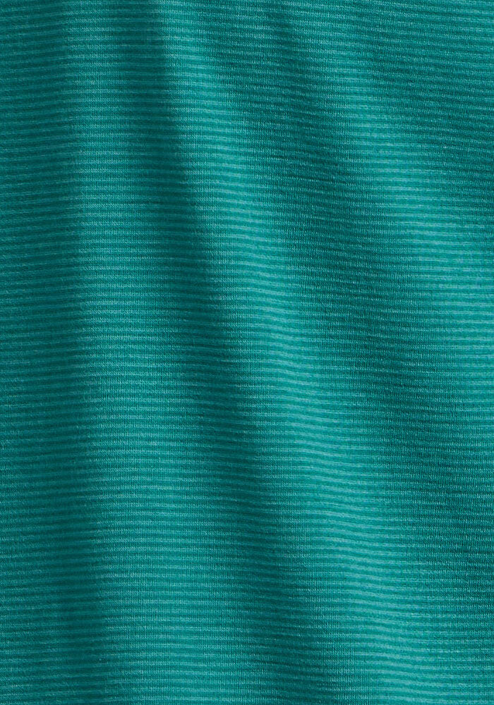 Close-up of textured green fabric from the Woolx Preston Polo - Woodland Mini Stripe, featuring fine horizontal stripes and soft folds that create subtle shadows.