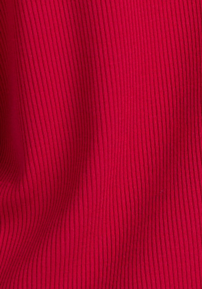Close-up of Woolx Vivi Ribbed Tank in Poppy Spark shows vertical textured lines and soft folds. Final Sale.